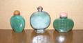 A Group of Three Chinese Jade Snuff Bottles