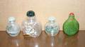 A Group of Four Chinese Glass Snuff Bottles
