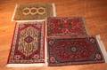 A Group of Four Persian Mats
