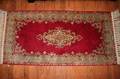 A Group of Four Persian Rugs