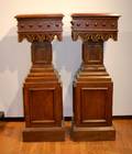 A Pair of Gothic Style Carved Square Pedestals