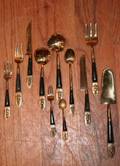 A Thai Brass Flatware Service for Twelve