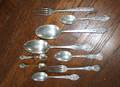 A Collection of Silver and Silverplate Flatware and Serving Accessories