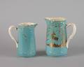 A Group of Two English Ceramic Molded Pitchers