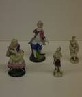 Four Continental Porcelain Figures