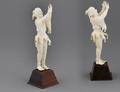 290 EUROPEAN CARVED IVORY FIGURE OF A JESTER