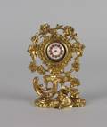 A Rococo Style Gilt Metal Watch Stand