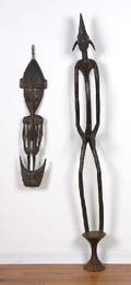 A Group of Two Carved Tribal Figures