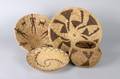 A Group of Four Woven Baskets