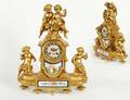 276 LOUIS XV STYLE GILT METAL AND PORCELAIN MANTEL CLO