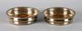 A Pair of English Silverplate Wine Coasters