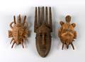 A Group of Three Carved African Masks