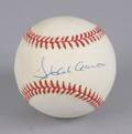 A Baseball by Signed Hank Aaron