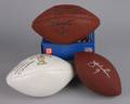 A Group of Three Signed Footballs