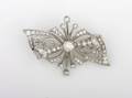 A 14 Karat White Gold and Diamond Brooch