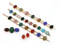 Three Yellow Gold and Carved Stone Bracelets