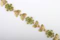 A 14 Karat Yellow Gold Peridot and Demantoid Garnet Bracelet Tiffany  Co