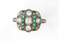 A Platinum Diamond and Emerald Ring