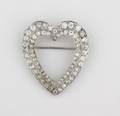 A 14 Karat White Gold and Diamond Brooch