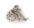 A 14 Karat White Gold and Diamond Brooch