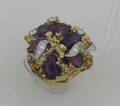 An 18 Karat Yellow Gold White Gold Diamond and Amethyst Ring