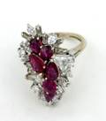 A 14 Karat White Gold Diamond and Ruby Ring