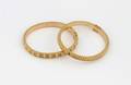 Two 18 Karat Hinged Bangle Bracelets