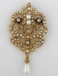 A Ladys Yellow Gold Seed Pearl and Diamond Pin
