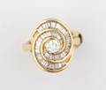 A Ladys 14 Karat Yellow Gold and Diamond Ring