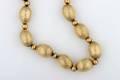 A 14 Karat Yellow Gold Textured Bead Necklace