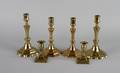 Three Pairs of English Brass Candlesticks