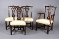A Set of 13 George III Style Carved Mahogany Dining Chairs
