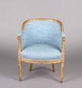 A French Directoire Carved Giltwood Bergere