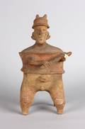 A PreColumbian Style Figure of a Nude Man