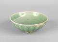 A Chinese Celadon Glazed Molded Porcelain Lotus Bowl