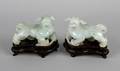 A Pair of Chinese Jade Figures of Foo Dogs