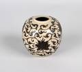 A Chinese Molded Ceramic Jar