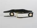 An Yves Saint Laurent Black Patent and White Leather Belt