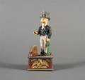A Painted Cast Iron Bank Depicting Uncle Sam After Putnam Investments