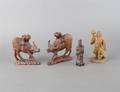 A Grouping of Asian Carved Hardwood Figures