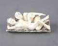 An Ivory Carving of an Erotic Figural Group