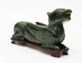 502 CARVED GREEN JADE ARCHAISTIC ANIMAL
