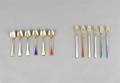 A Grouping of Silver and Enamel Spoons and Forks
