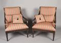A Pair of Regency Style Mahogany Oversized Upholstered Arm Chairs