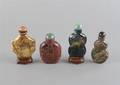 A Group of Four Hardstone Snuff Bottles