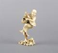 A Japanese Carved Ivory Figure of a Man