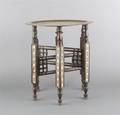 A Middle Eastern Brass and Bone Inlaid Table