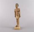 An Egyptian Carved and Polychrome Decorated Tomb Figure