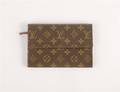 A Louis Vuitton Clutch Wallet