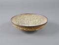 A Ceramic Bowl with Crater Glaze James Lovera American b 1920